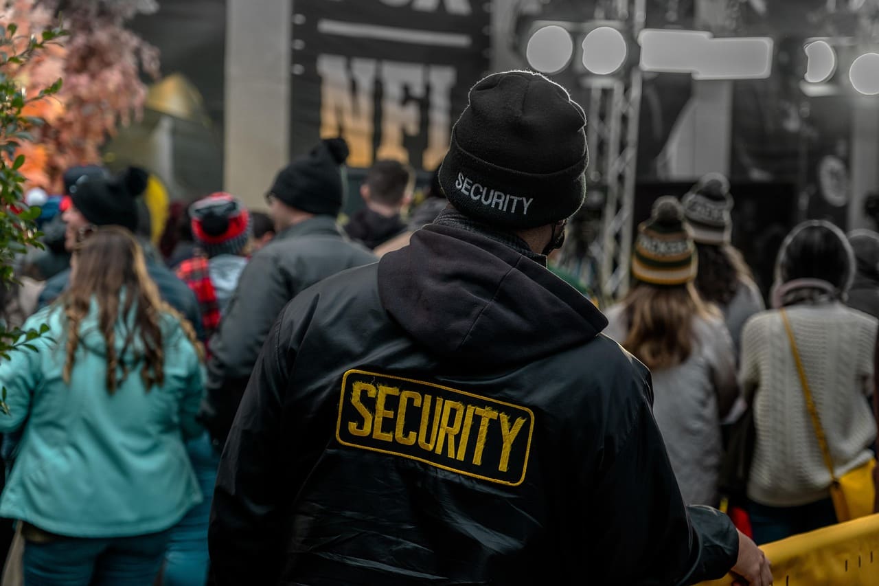 our-story security guard, crowd, crowd control, concert, security guard, security guard, security guard, security guard, security guard